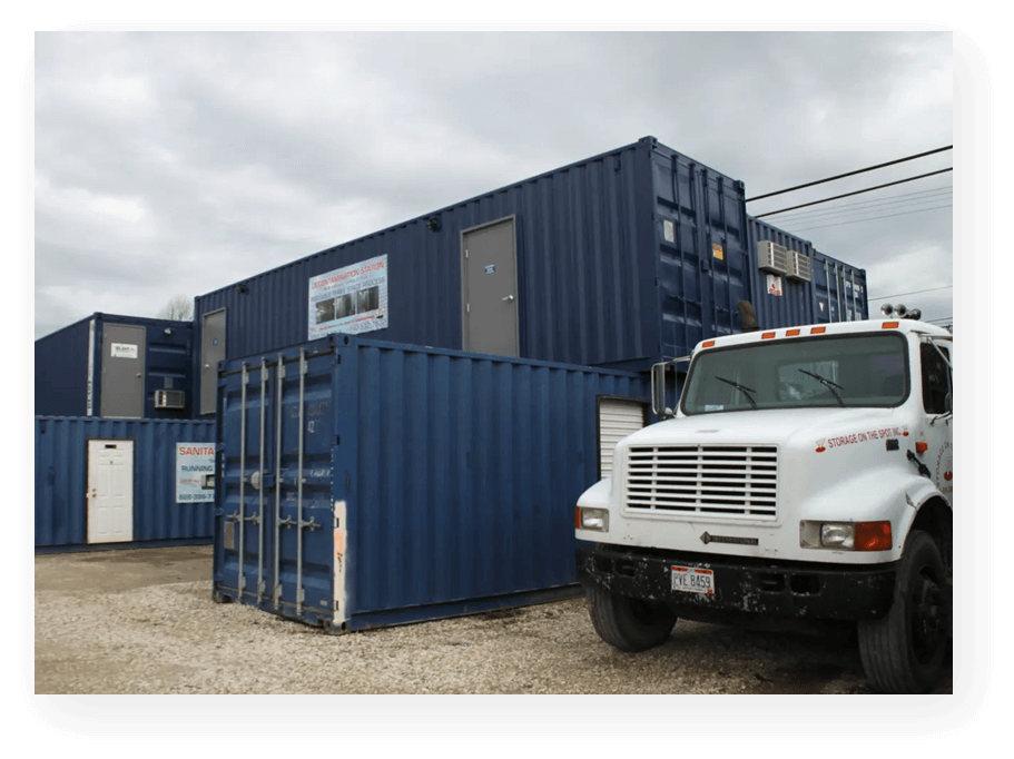 Ship containers and a truck